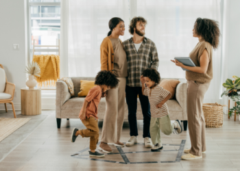 A family talking to a realtor.