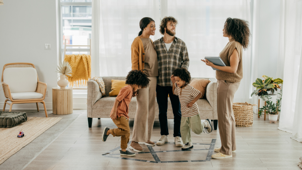 A family talking to a realtor.