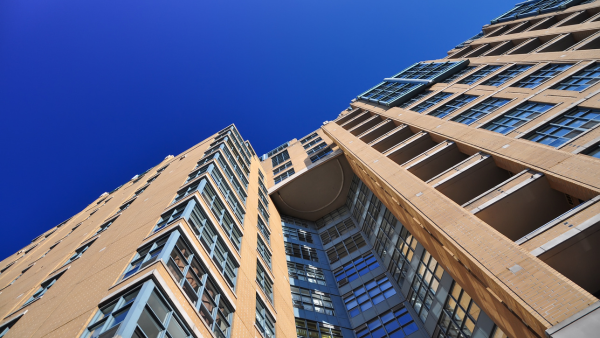 A building as seen from the ground in downtown Toronto.