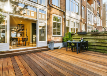 A courtyard with wood flooring.
