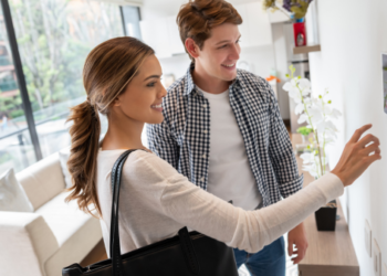 A couple using smart home technology.