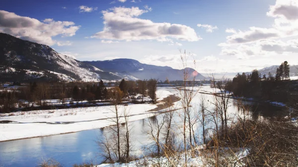 A snowy mountain and river