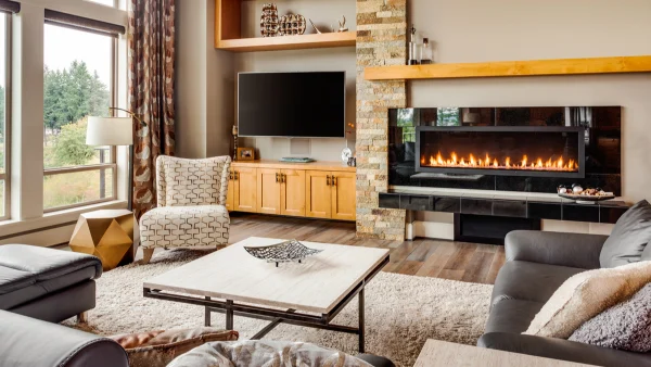 A cozy living room with a modern electric fireplace
