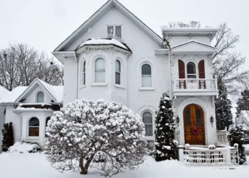 A home covered with snow