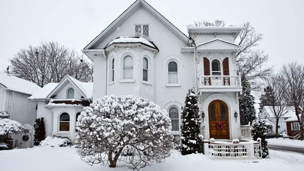 A home covered with snow