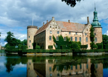 Castle surrounded by a moat.