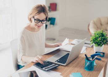 young woman accounting at her desk