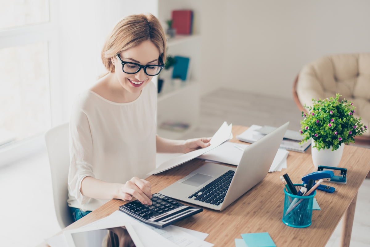 young woman accounting at her desk
