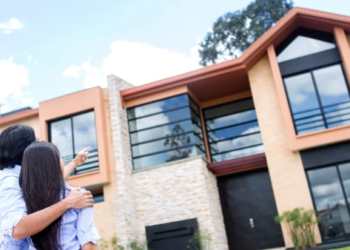 Couple looking at homes.