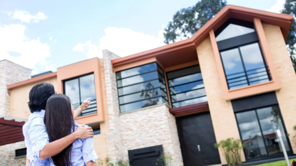 Couple looking at homes.