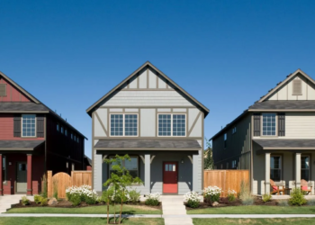 Three single family homes in a neighbourhood