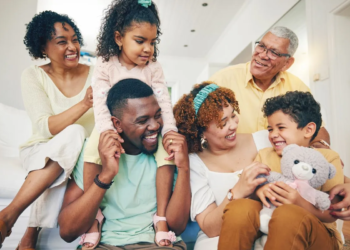 a photo of two couples and two young kids