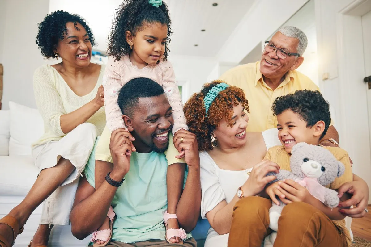 a photo of two couples and two young kids