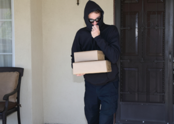 A man stealing packages.