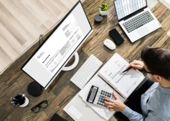 A man at a computer filing his taxes