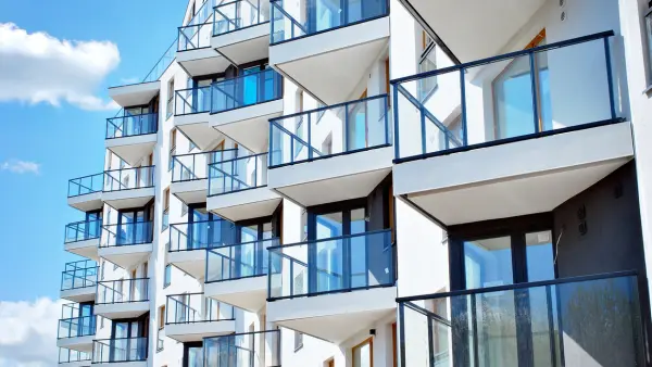 Exterior of white condo building's balconies