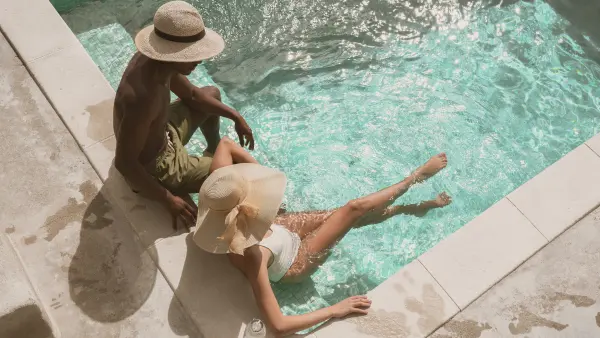 Couple lounging in pool