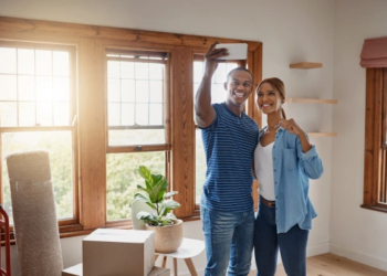 A couple moving into their first condo apartment