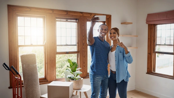 A couple moving into their first condo apartment