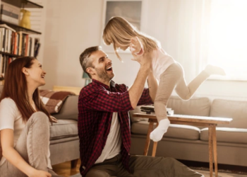 A family playing in a home