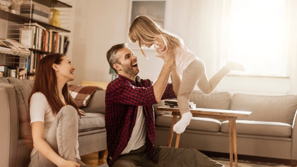 A family playing in a home