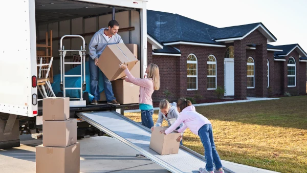 A family moving boxes.