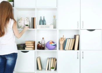 A woman organizing home.