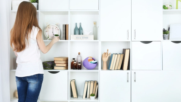 A woman organizing home.