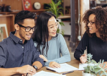 A couple discusses mortgage options with an advisor