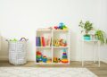An image of a child's playroom that has proper toy organization in place