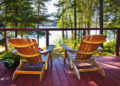 Adirondack chairs looking out on a cottage balcony