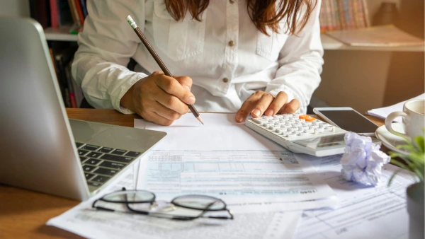 A woman working on her budget