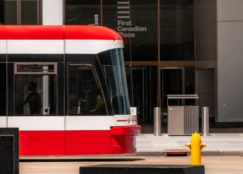 Red Toronto streetcar in downtown core