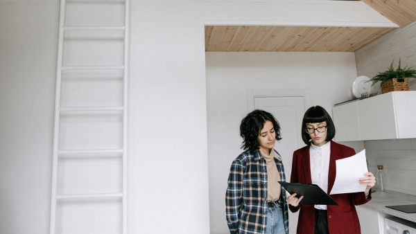 Real estate agent chatting with client