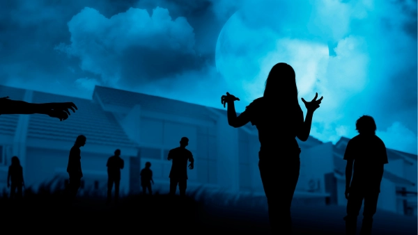 A spooky blue sky and monster silhouettes