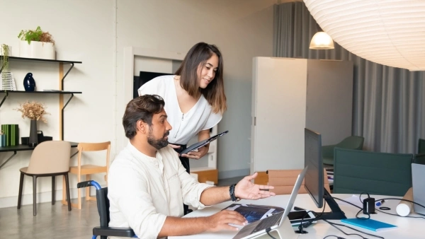 couple chatting at a kitchen table