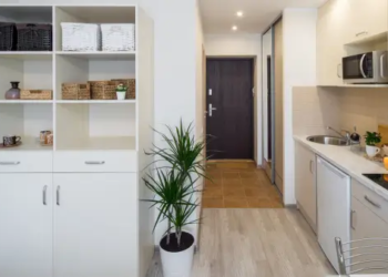 A kitchen with lots of storage.