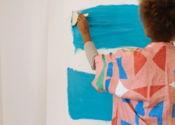 woman painting home