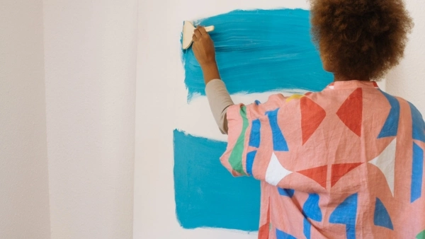woman painting home