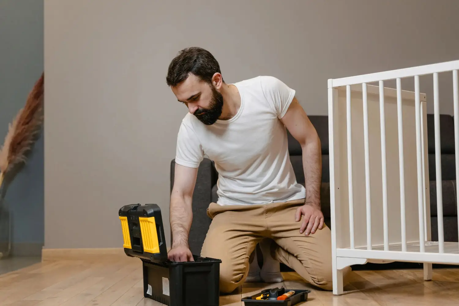 Man looking at tool box