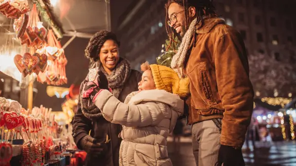 A family at a holiday market.