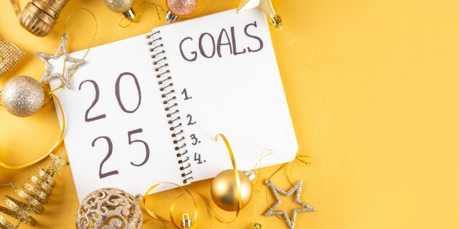 A journal with "goals" written in big letters at the top of the page.
