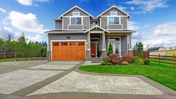 the exterior of a house that's well manicured
