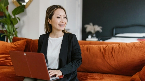 woman on her laptop at home