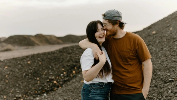 couple hugging on a hike