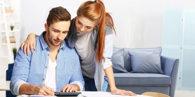 A couple reviews their finances together