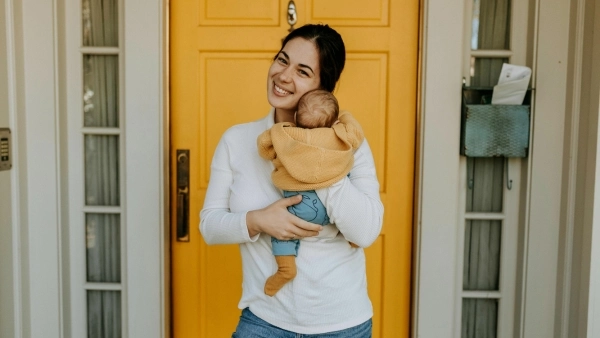 Woman holding newborn