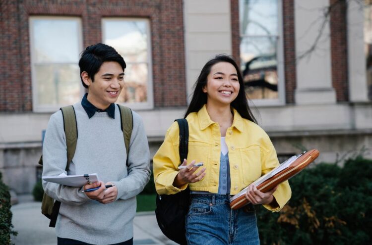 two students walking to campus