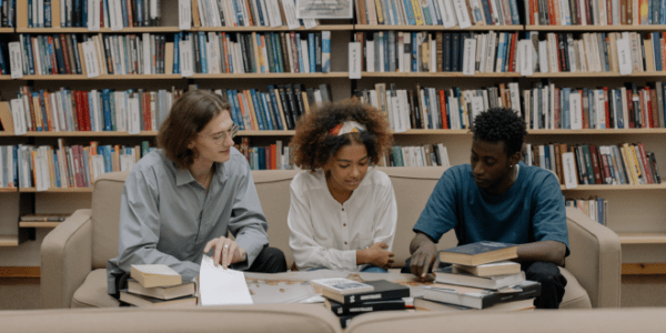 A group of students studying in the library.
