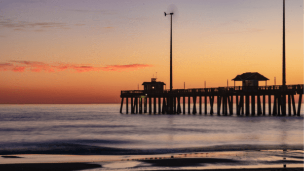 A pier at sunset in Nags Head, North Carolina